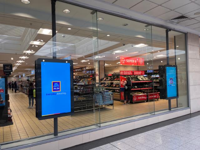 SpacePole Universal Indoor Enclosures installed in Aldi store window